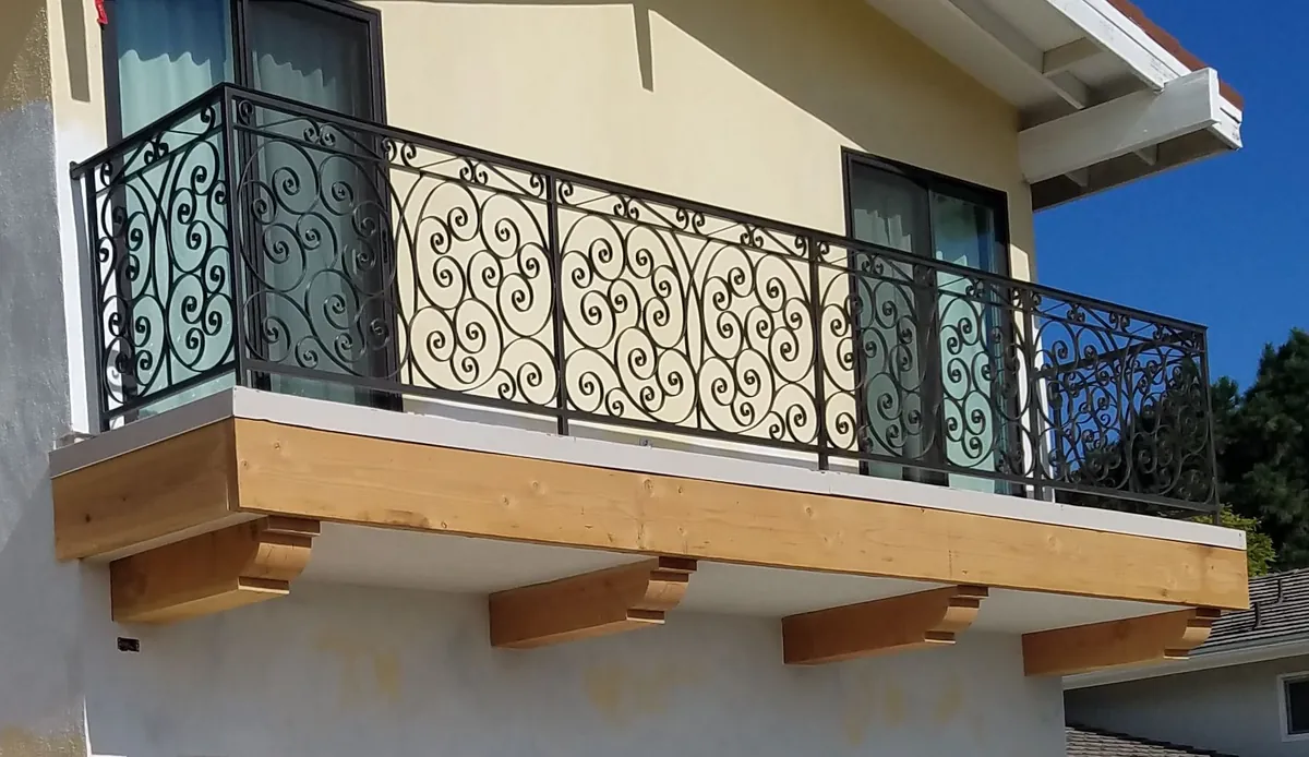 Scrollwork balcony guardrail on a home in Manhattan Beach