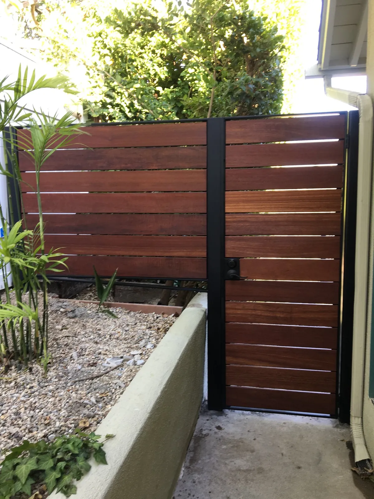 Steel-frame gate with wood slats