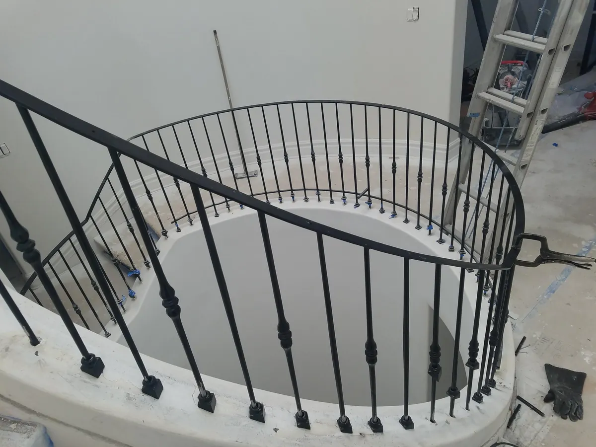 Curved rail with turned balusters