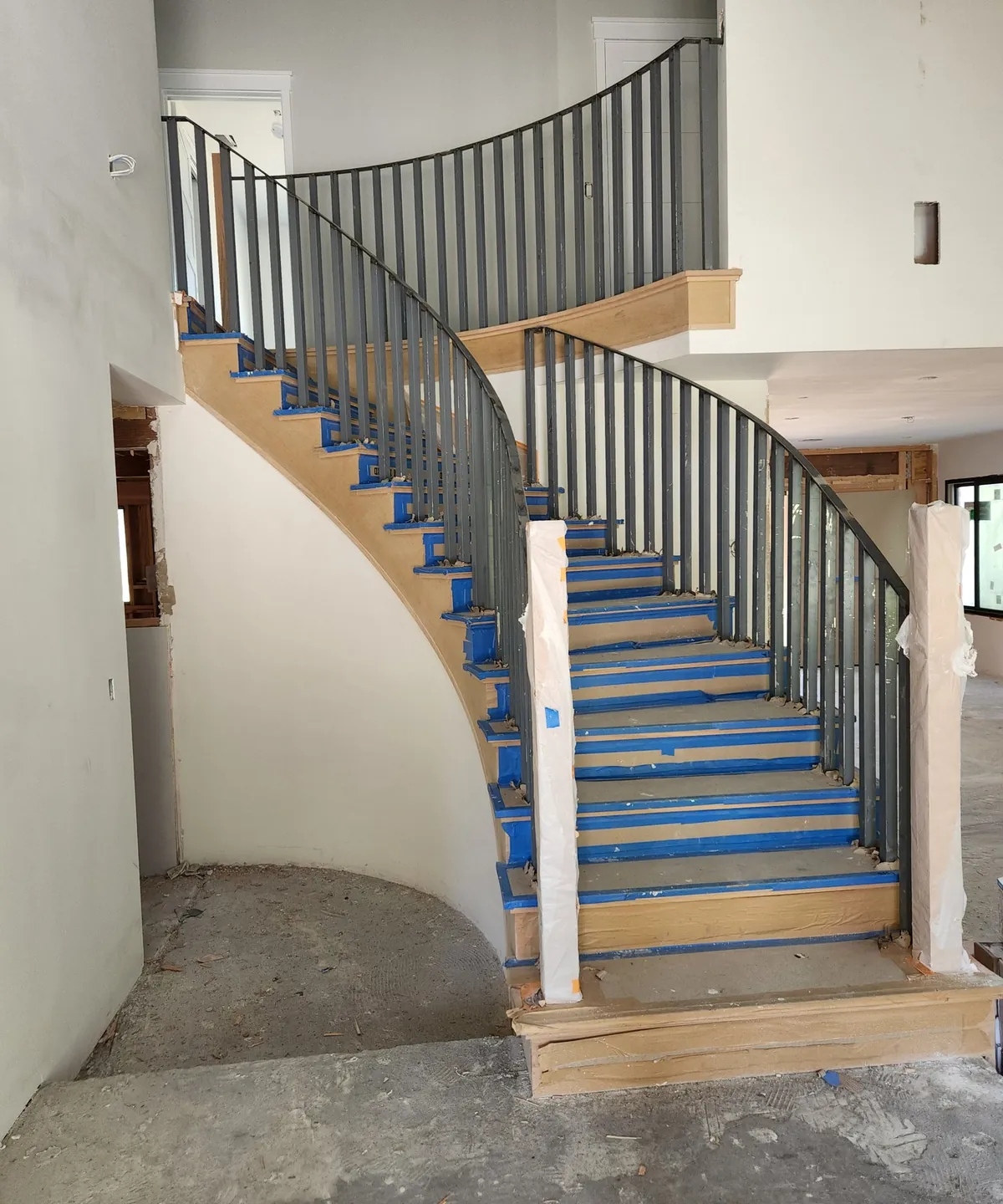 Curved stair rail in flat bar